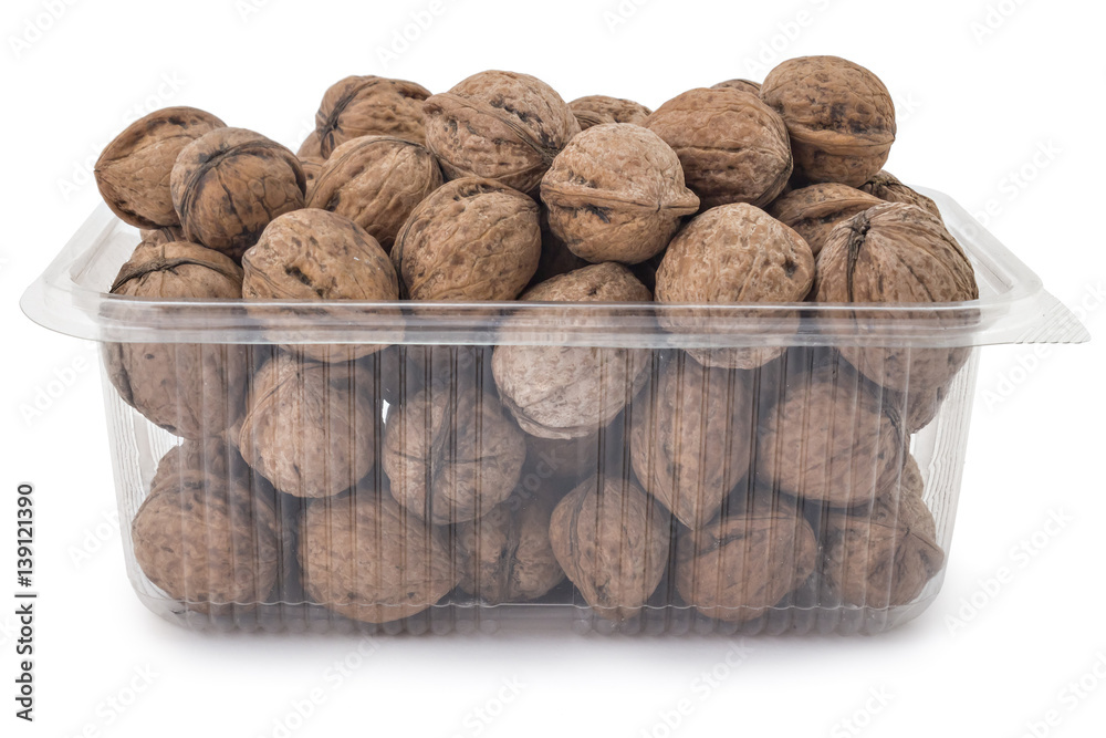 Box or punnet of dried walnuts isolated on a white background Box or punnet of dried walnuts isolated on a white background
