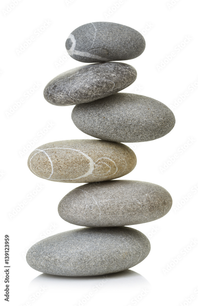 Balanced stone tower isolated on white background Balanced stone tower isolated on white background