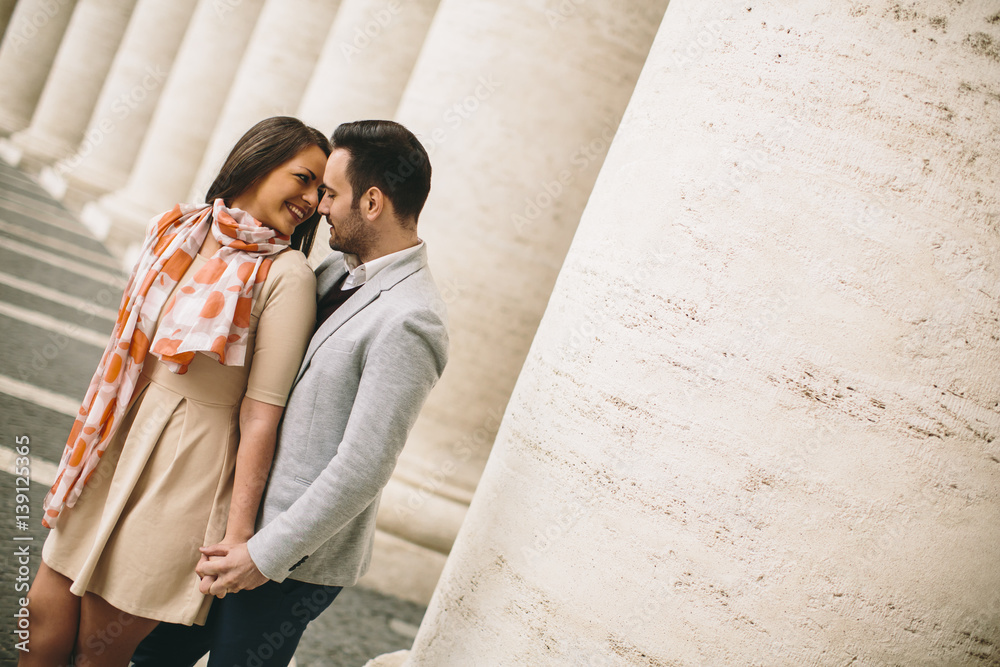 Loving couple at the St. Peter's Square in Vatican