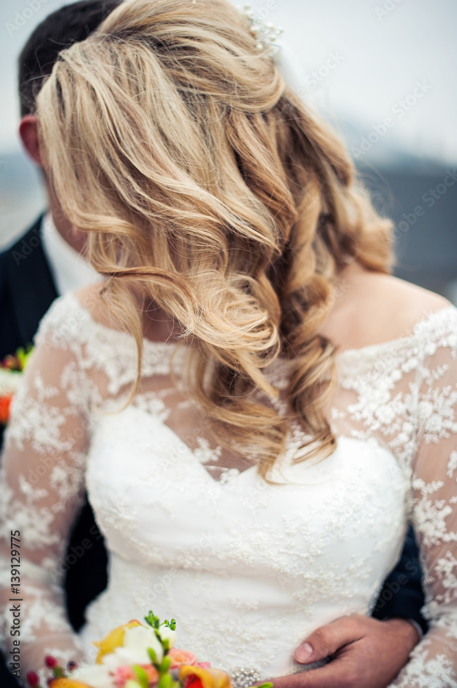 close up of bridal wedding white dress . cloth and beads close up of bridal wedding white dress . cloth and beads
