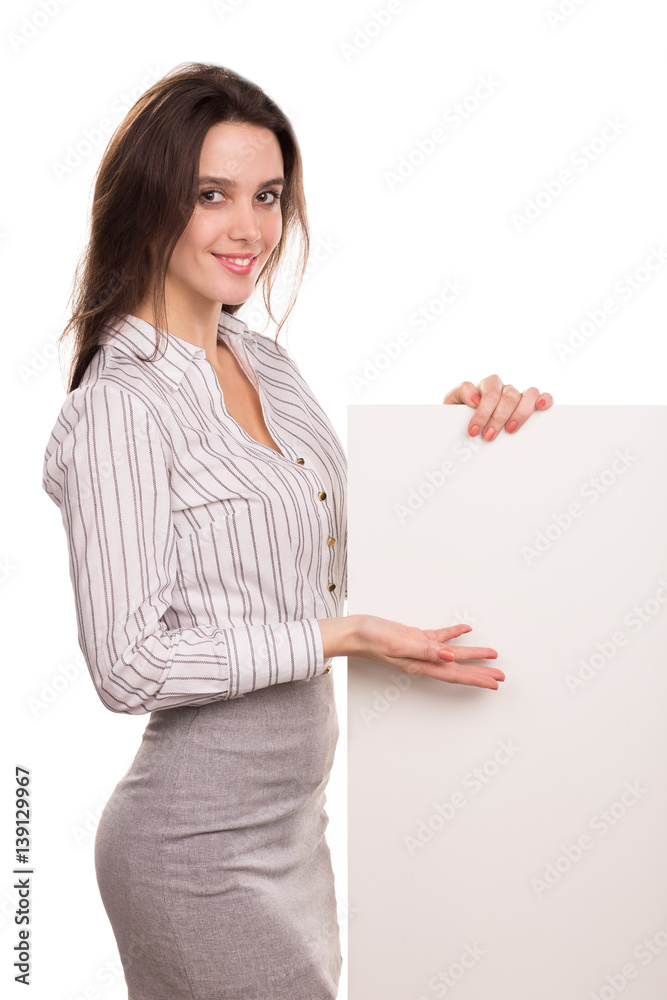 Woman showing and pointing at blank billboard banner Woman showing and pointing at blank billboard banner