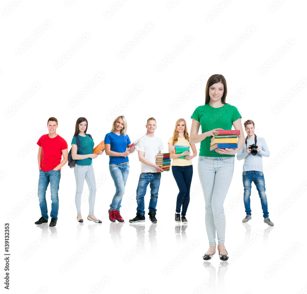 Large group of teenage students isolated on white background. Many different people standing together. School, education, college, university concept. Large group of teenage students isolated on white background. Many different people standing together. School, education, college, university concept.