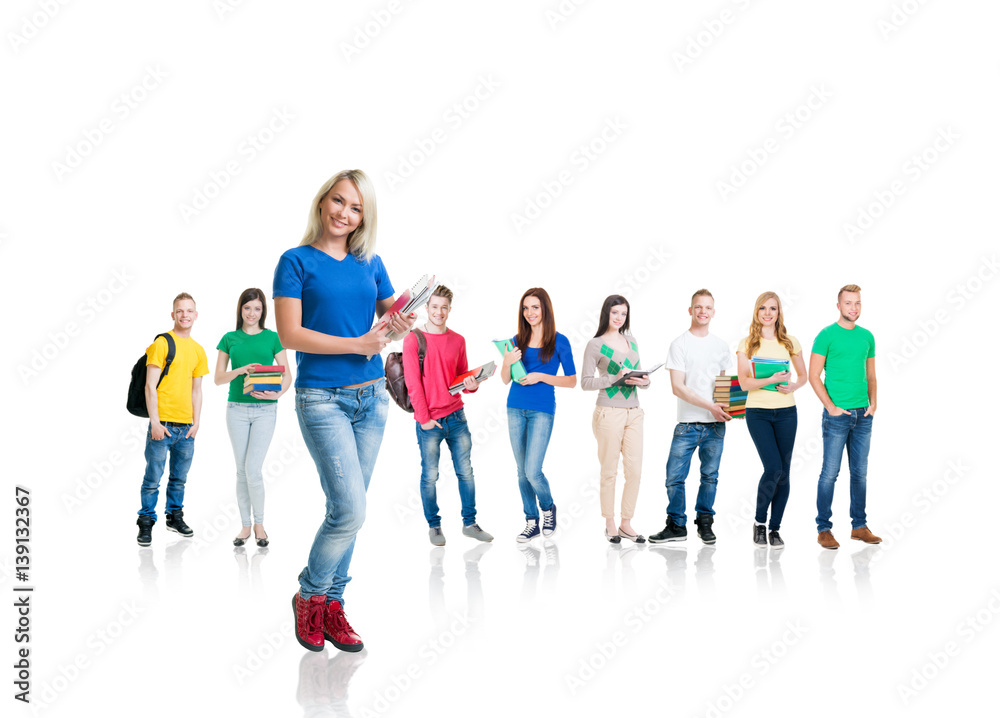 Large group of teenage students isolated on white background. Many different people standing together. School, education, college, university concept. Large group of teenage students isolated on white background. Many different people standing together. School, education, college, university concept.
