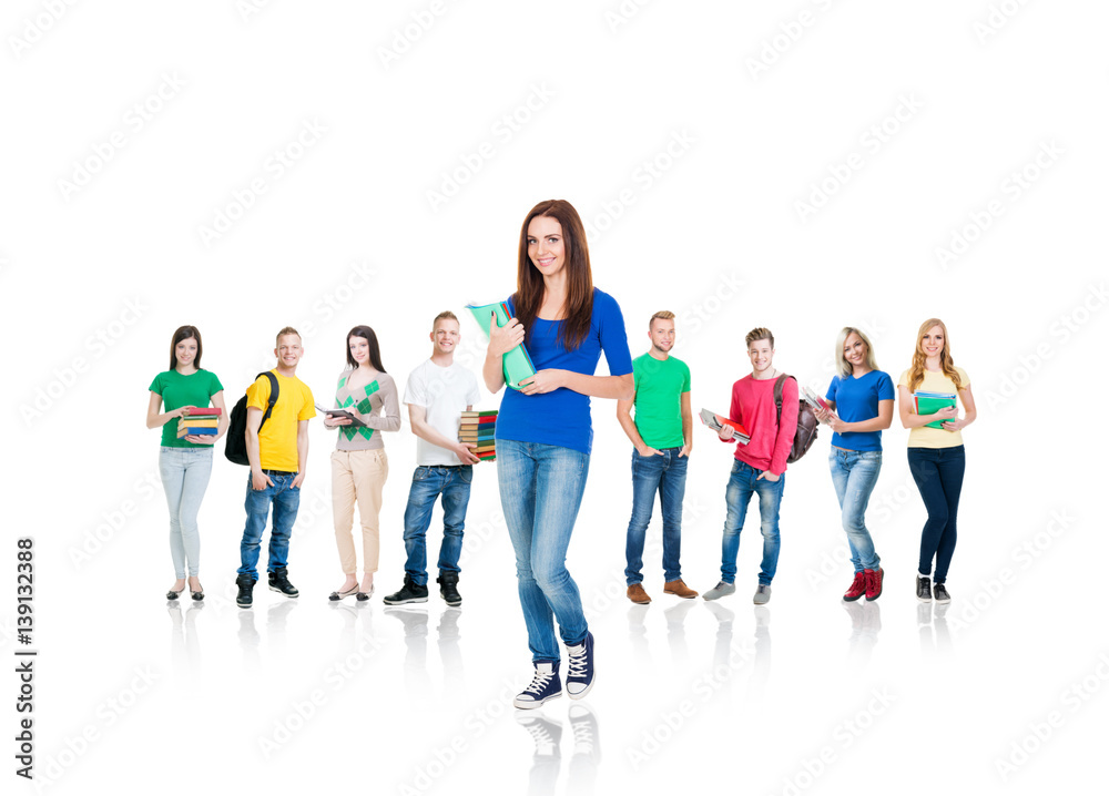Obraz premium Large group of teenage students isolated on white background. Many different people standing together. School, education, college, university concept.