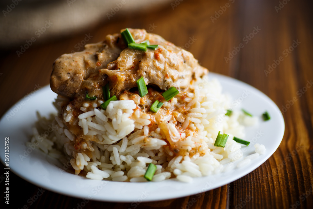 Boiled rice with rabbit meat and sauce Boiled rice with rabbit meat and sauce