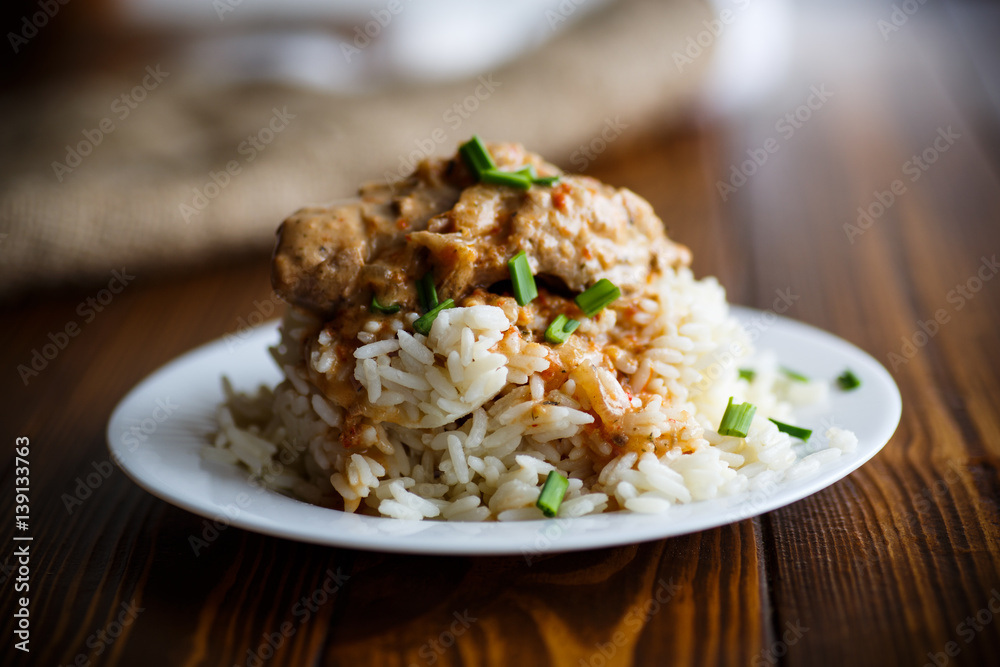 Boiled rice with rabbit meat and sauce Boiled rice with rabbit meat and sauce