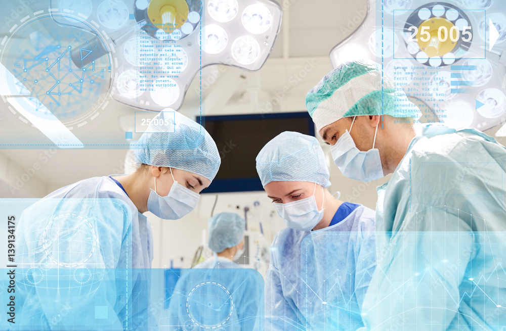 Fototapeta premium group of surgeons in operating room at hospital