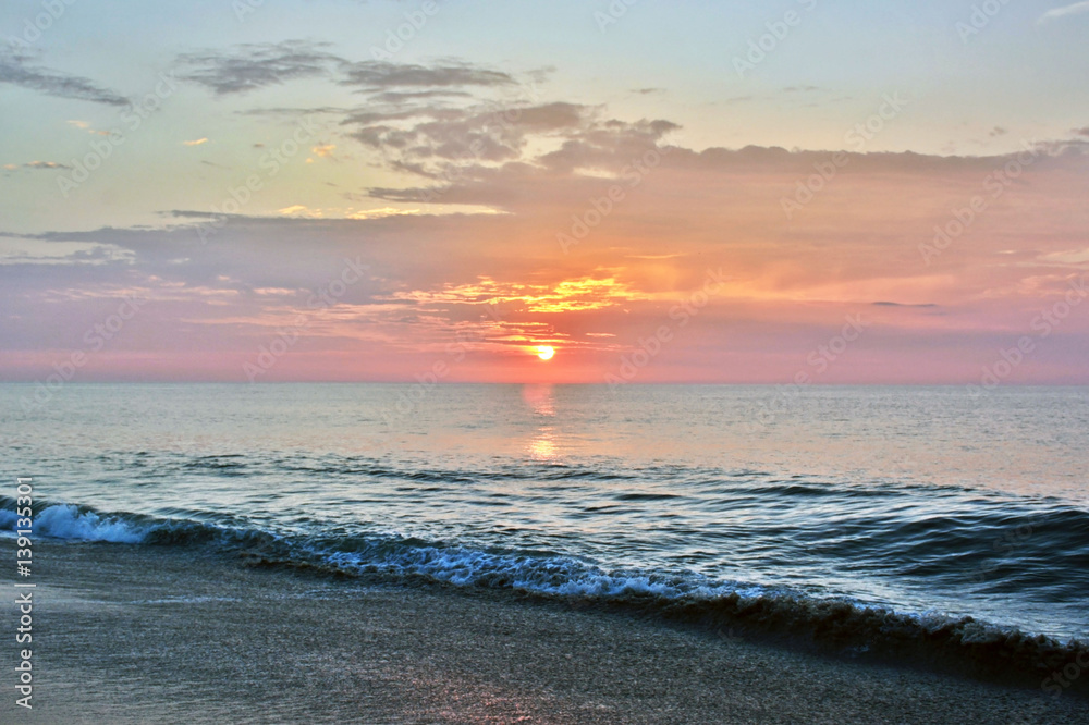 Fototapeta premium Serene Summertime Sunrise Along the Shore