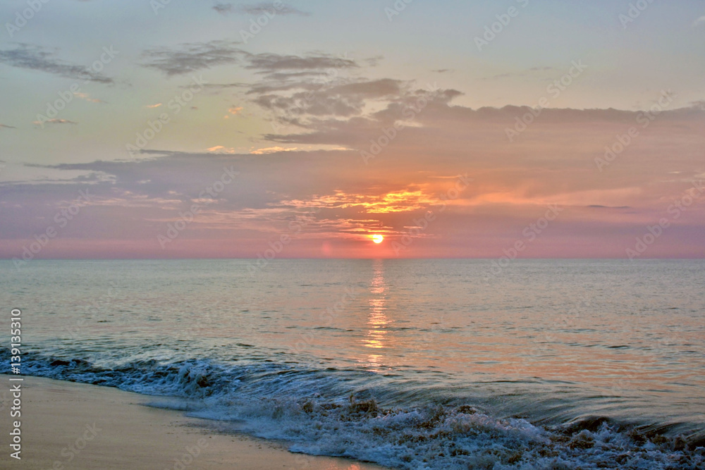 Fototapeta premium Soothing Summer Seas at Sunrise on the Shore