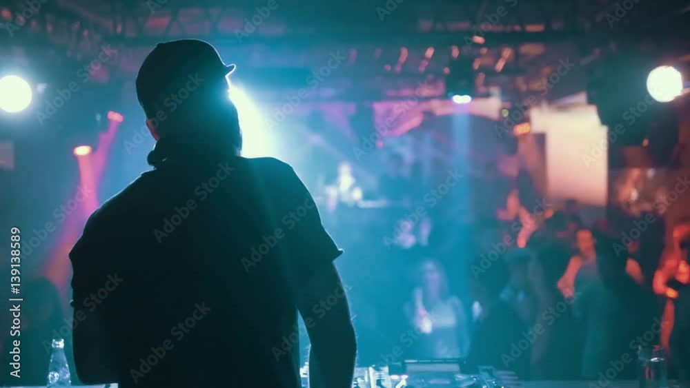 DJ Turns The Records at The Modern Nightclub, Back View, Slow Motion