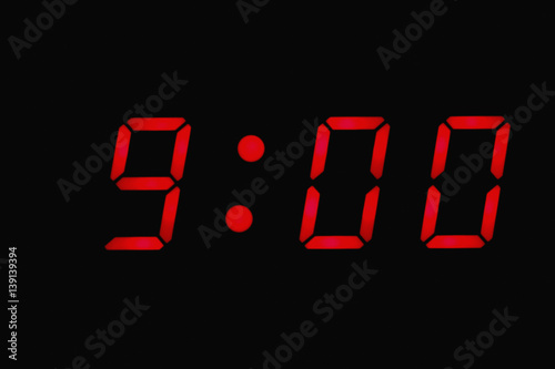Digital clock displaying nine o'clock