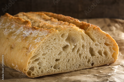 Fresh piece of bread on papper