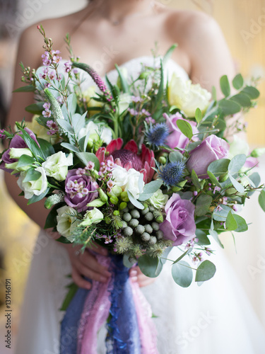 wedding bouquet in bride's hands