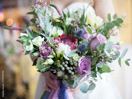 wedding bouquet in bride's hands