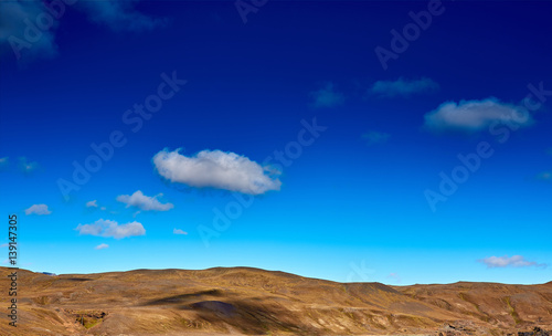 Travel to Iceland. Beautiful Icelandic landscape with mountains  sky and clouds. Trekking in national park Landmannalaugar