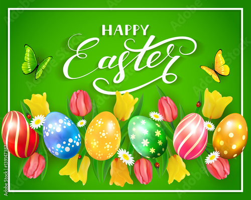 Easter eggs and flowers on green background