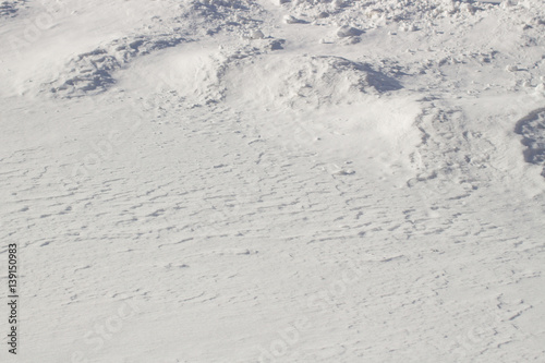 Snow surface close up macro, winter background, shallow depth of field