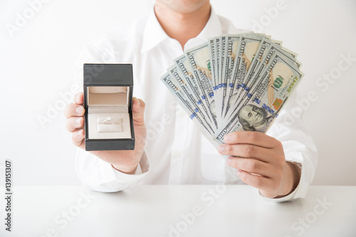 diamond ring and cash photo