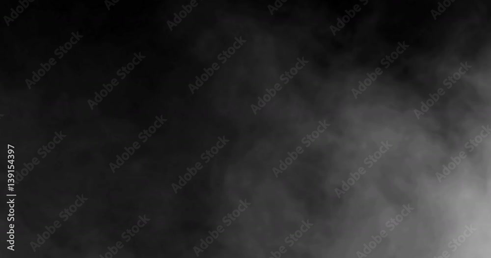 smoke slowly floating through space against black background