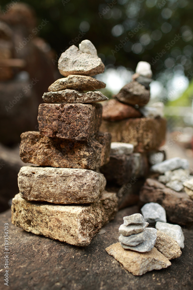 Stones pyramid,balance and wellness spa concept, zen like and well being tranquil composition.