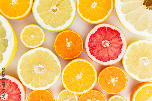 Citrus fruits on white background. Flat lay, top view. Fruit's background