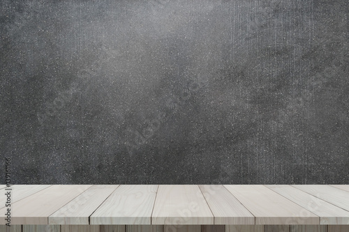 Wooden table or wooden planks with concrete wall or marble wall for background. Abstract background.