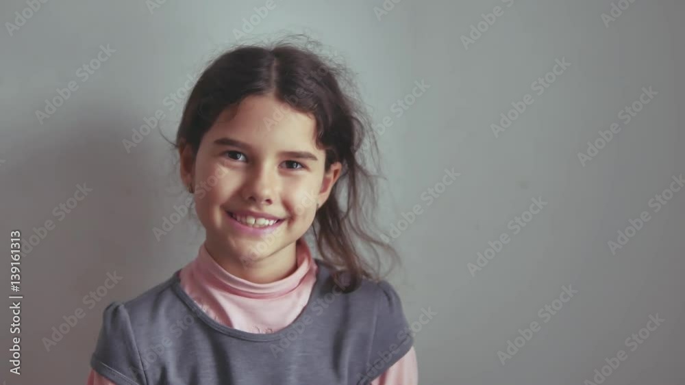 teen school girl smiling on gray background indoor the lifestyle teen school girl smiling on gray background indoor the lifestyle