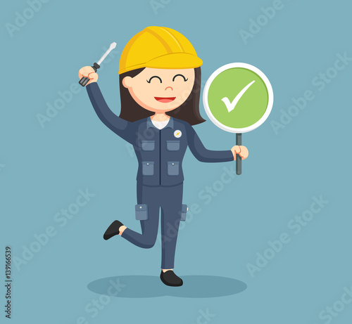 female electrician with checklist sign © The Last Word