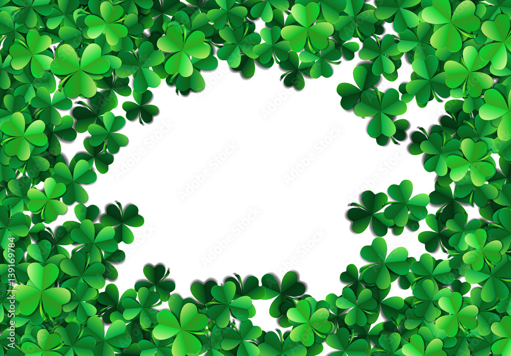 Saint Patricks day background with sprayed green clover leaves or shamrocks Saint Patricks day background with sprayed green clover leaves or shamrocks
