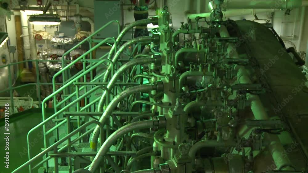 Engine room of a cargo ship. The engine room is the heart of the ship providing mechanical and electrical power for the entire ship. Engine room of a cargo ship. The engine room is the heart of the ship providing mechanical and electrical power for the entire ship.