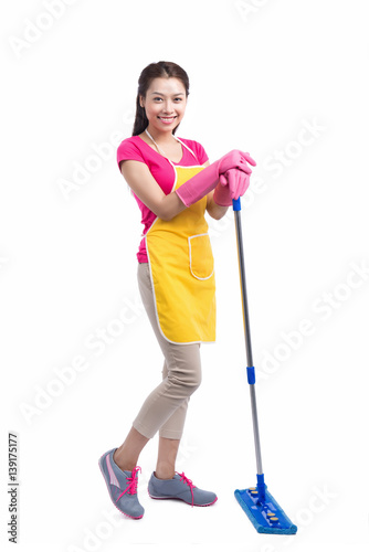 Portrait Of Young Asian housewife Cleaning Floor With Mop in full length