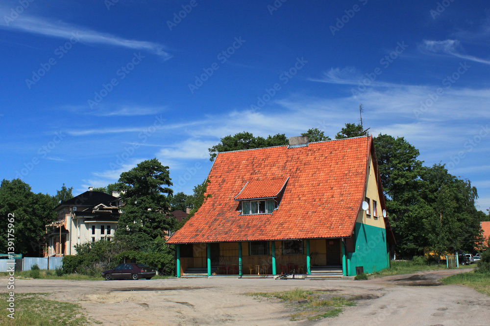 Old former german building in the Morskoe (Pillkoppen) village in the Curonian Spit National Park. Russia.