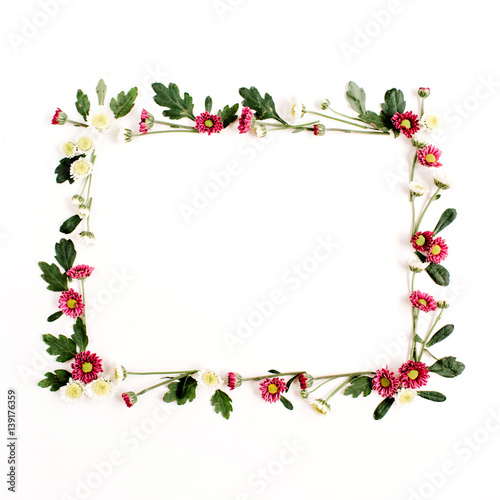 Frame wreath with red and white wildflowers, green leaves, branches on white background. Flat lay, top view. Flower background. © Floral Deco
