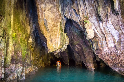 Tour Boat and Tourists Entering Underground River Cave - Palawan Philippines