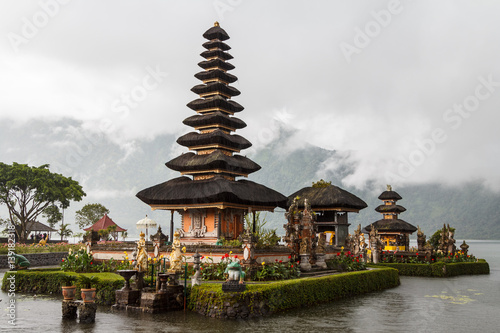 Old Ulun Danu temple on Bratan lake in the rain, Bali island, Indonesia