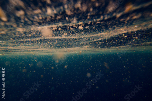 abstract underwater background with plankton