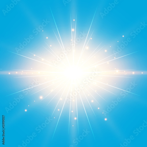 The sun in the blue sky bac...