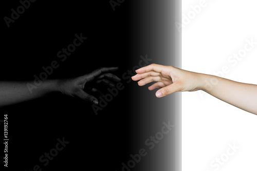 hand reaching out with reflection on mirror