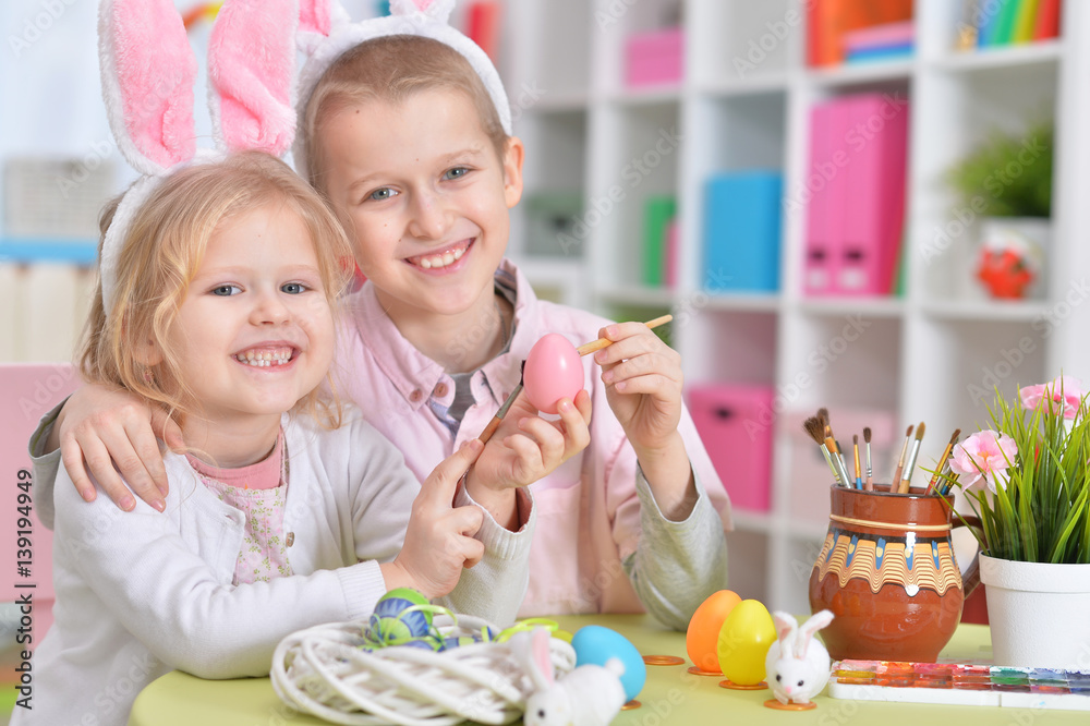 Fototapeta premium Happy family preparing for Easter