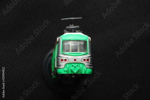 An old and dirty train toy model represent the train toy for hobby and collection concept related idea.