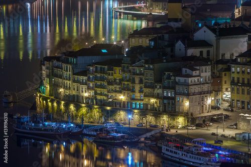 night cityscape view city of Porto and Douro river in Portugal © Sodel Vladyslav