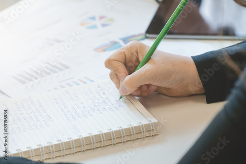 Business woman hand writing,To do list planing and strategy business concept