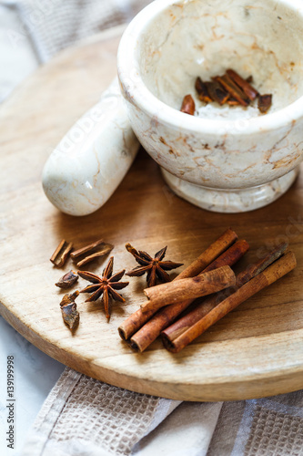 stone mortar for spices: cinnamon and star anise