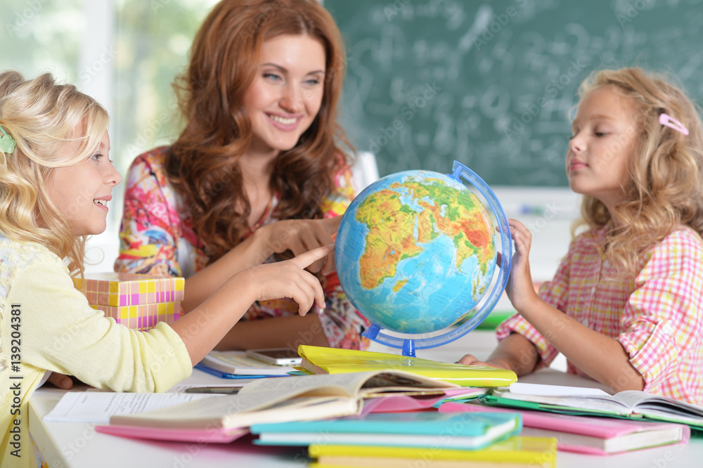 teacher with two girls at lesson teacher with two girls at lesson