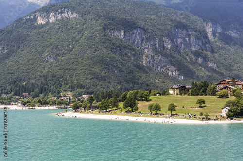 Beach on lake Molveno in Italy