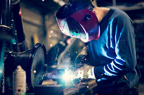 Welding steel with sparks using mig mag welder 