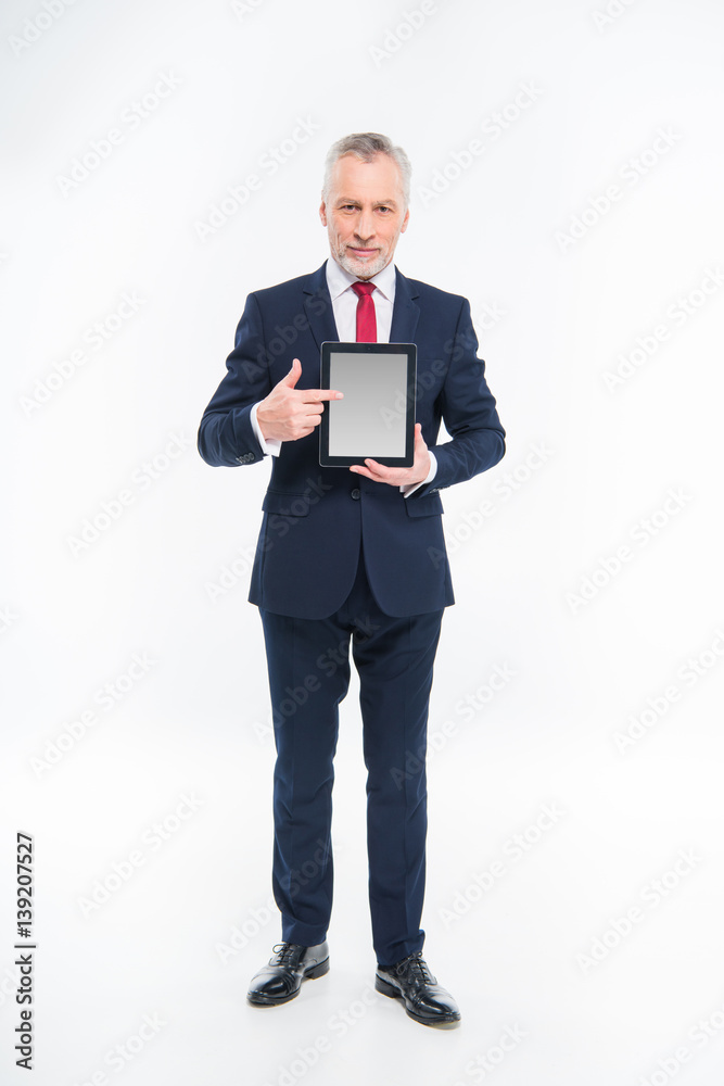 Businessman holding digital tablet Businessman holding digital tablet