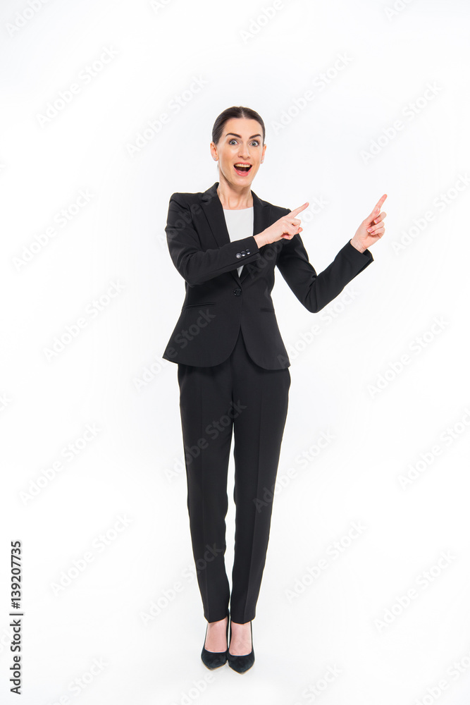 Businesswoman pointing with fingers Businesswoman pointing with fingers