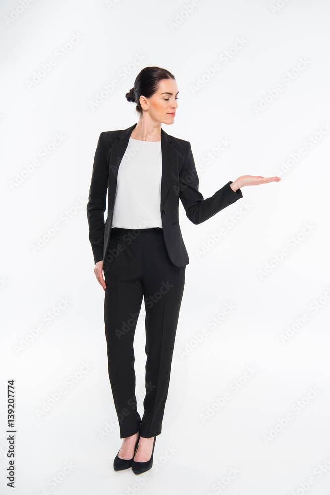Businesswoman looking at palm Businesswoman looking at palm