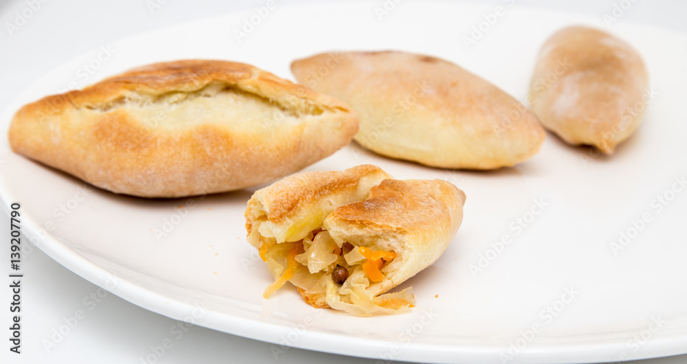 pies with cabbage on a white background pies with cabbage on a white background
